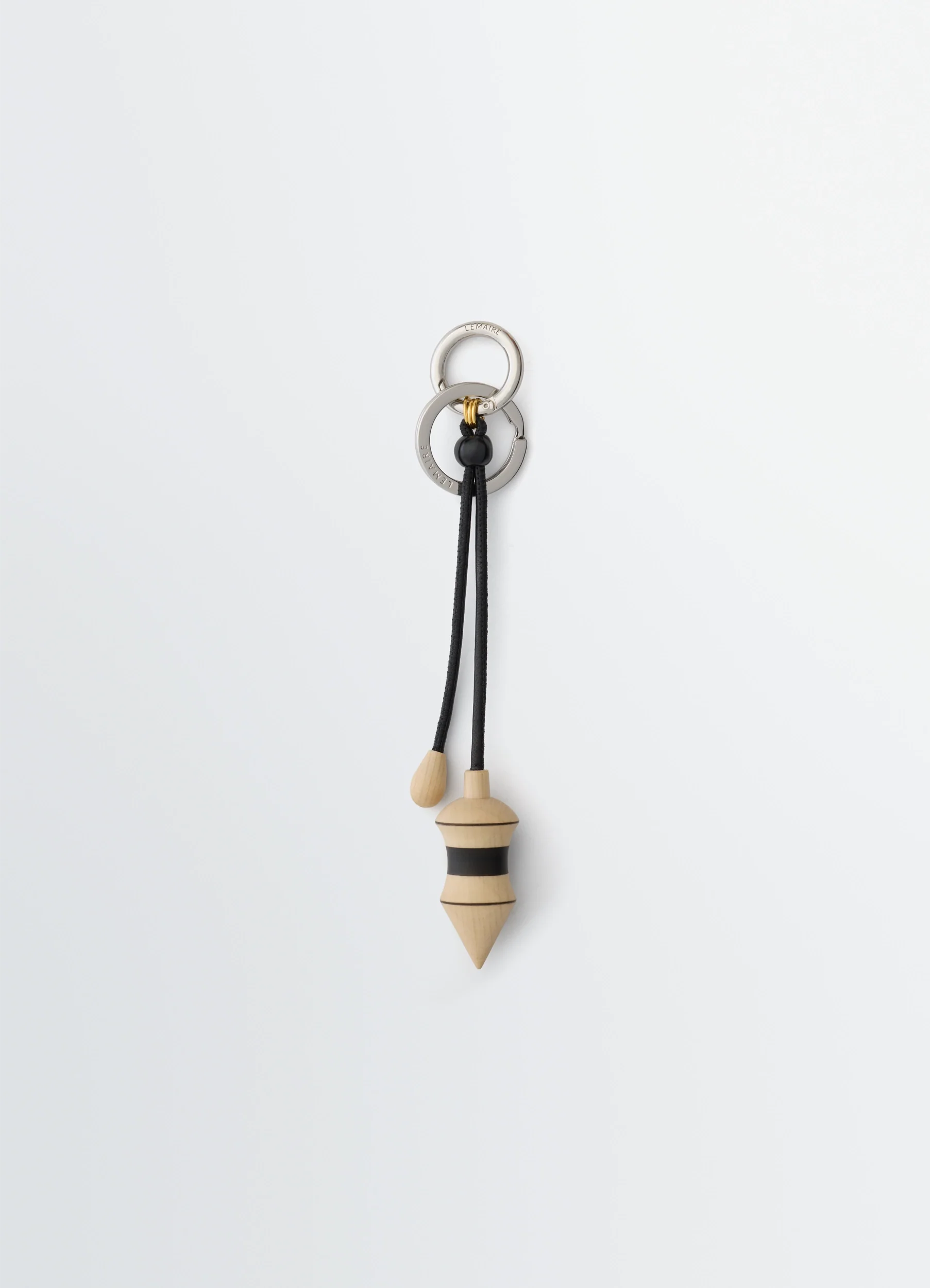 BLACK STRIPES PENDULUM BAG CHARM IN WOOD WITH CORD