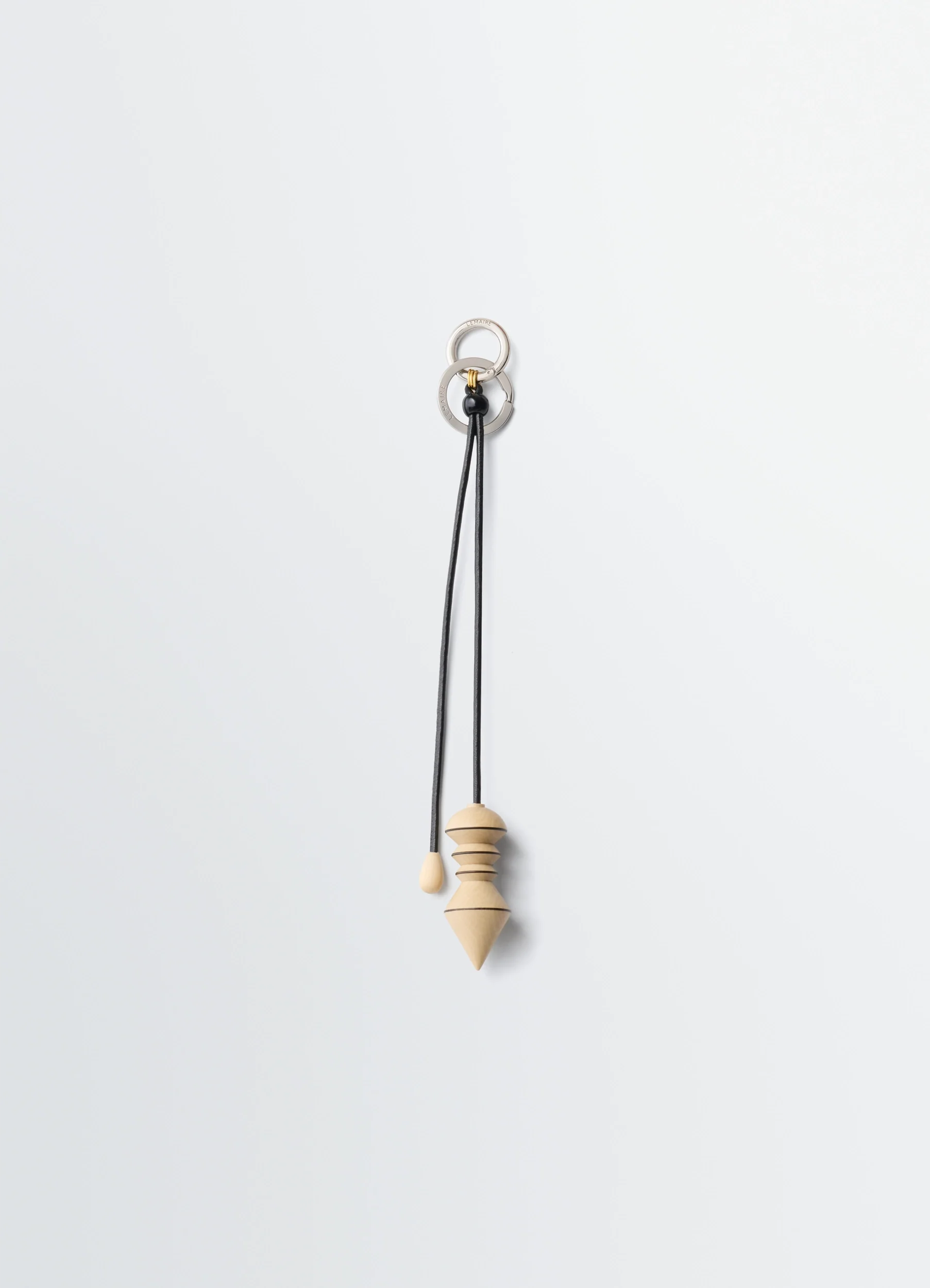 PENDULUM BAG CHARM IN WOOD