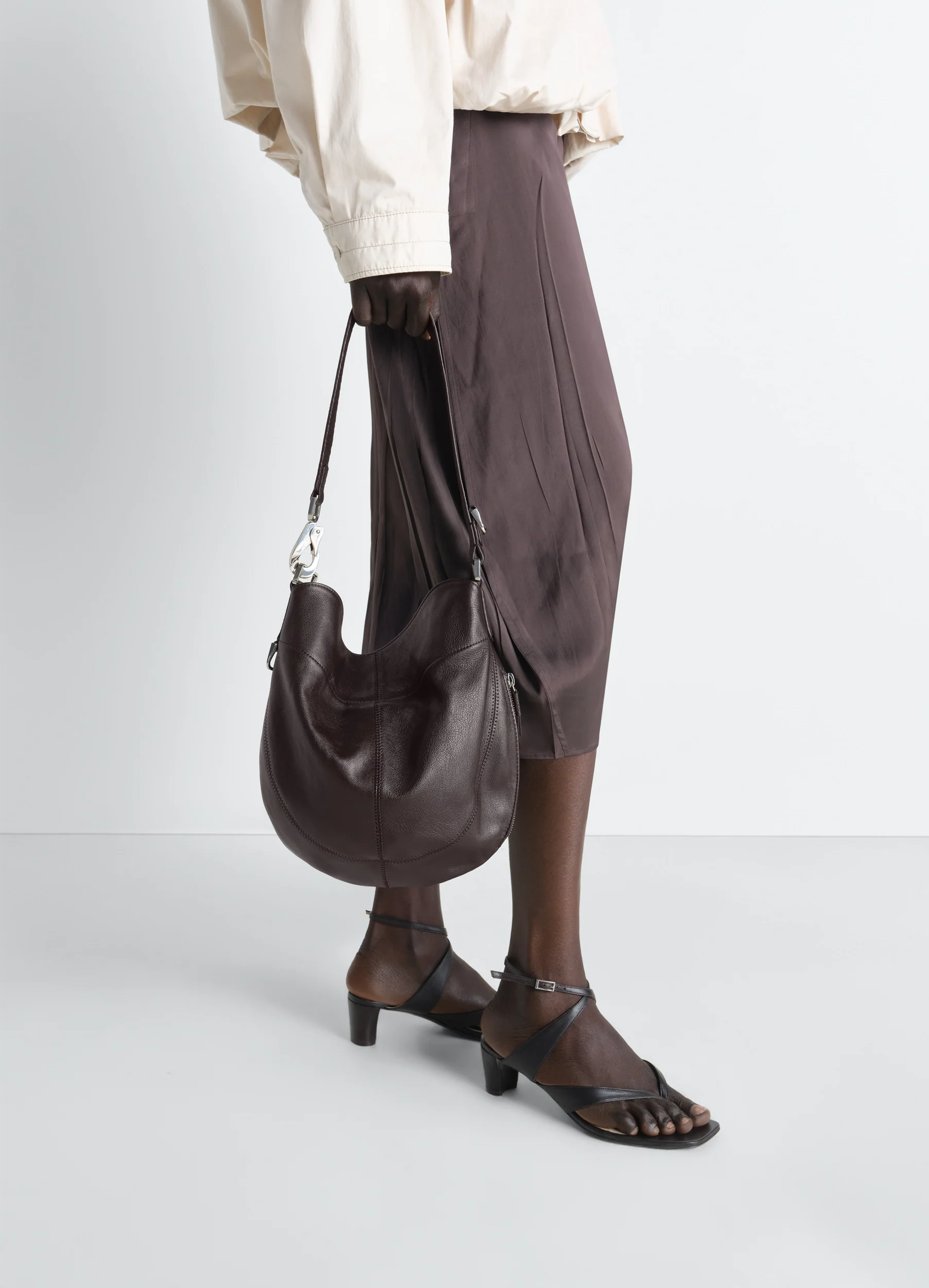 HOBO QUIVER CLIP BAG IN LEATHER