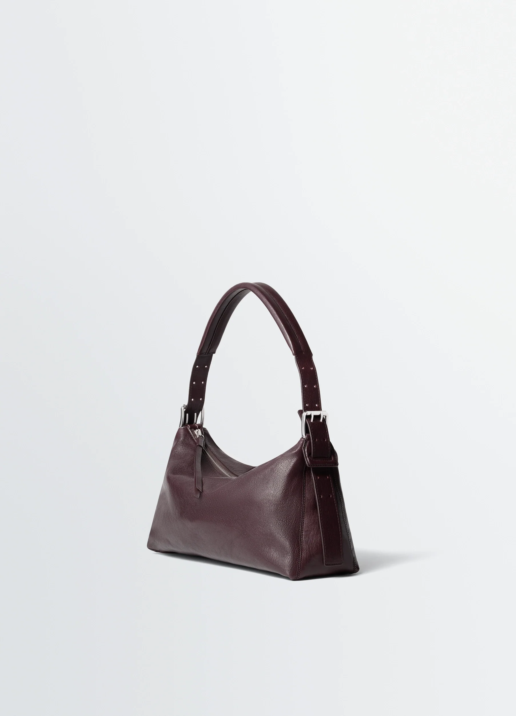 BELTED BAGUETTE BAG IN LEATHER
