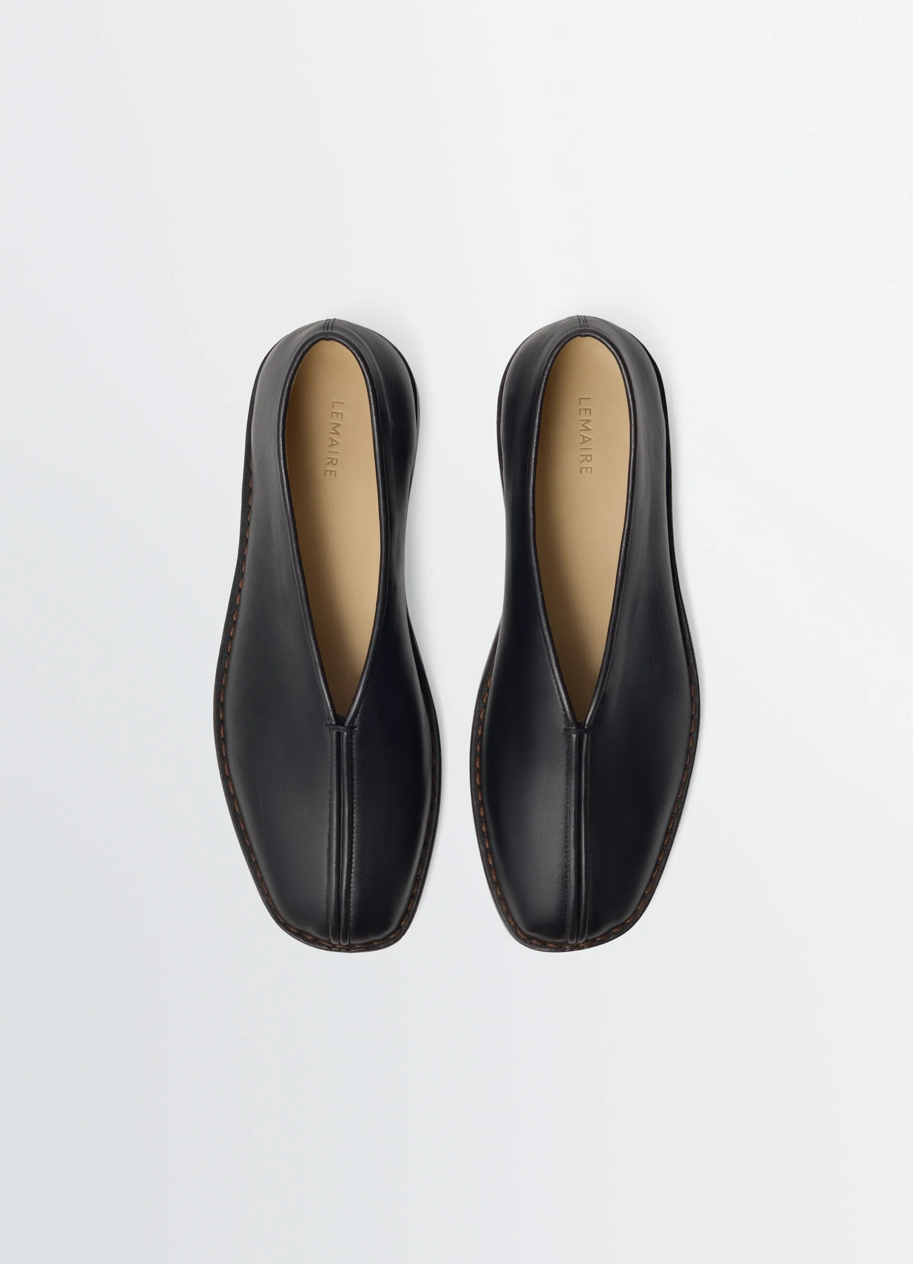 FLAT PIPED SLIPPERS IN LEATHER